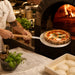 Pelle à Pizza ronde avec poignée en bois diamètre 1 005x355mm H15mm