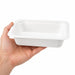 Barquette scellable blanche en pulpe laminée PLA - 250 ml - 13,7 cm x 9,5 cm x 3,3 cm - en main